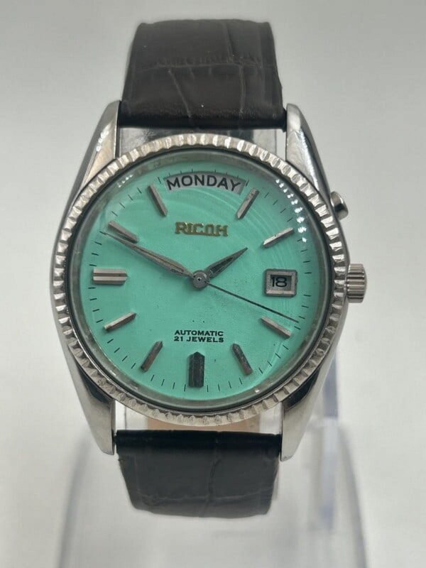 Vintage Ricoh Automatic Men?s Watch ? 21 Jewels, Mint Green Dial, Day & Date Display, Leather Strap
